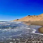 Sandwich Harbour in Namibia: Desert Meets Ocean Beach
